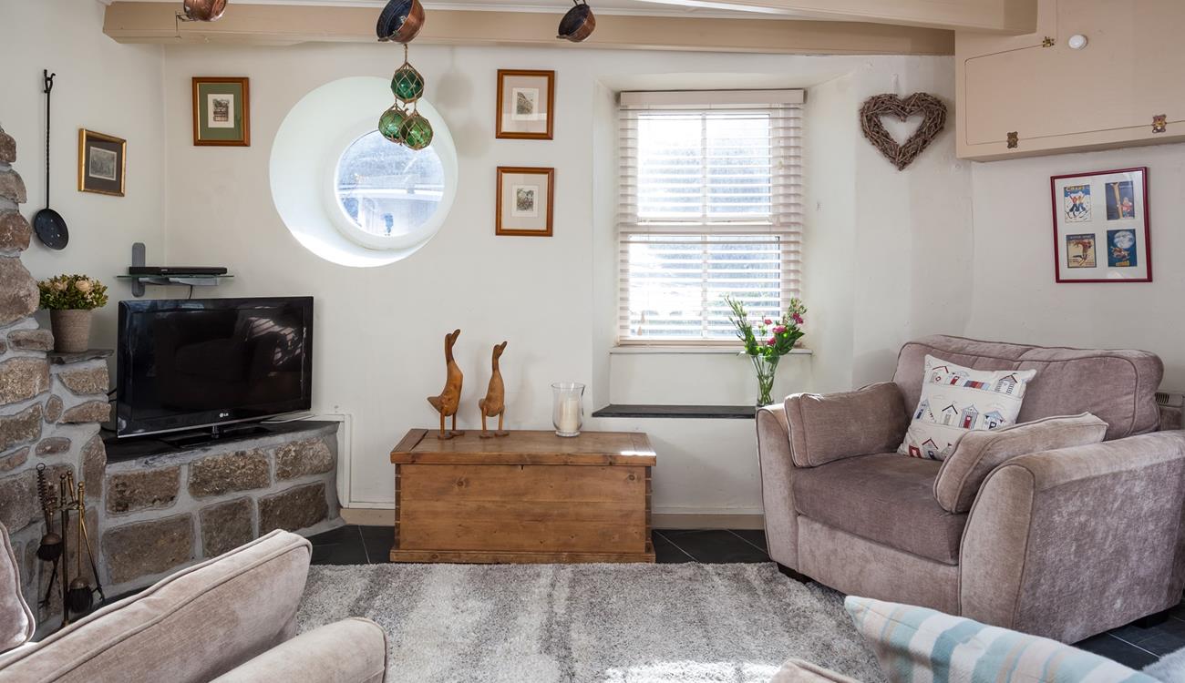 Relax in your cosy sitting room spending your evening with a good film on the TV.