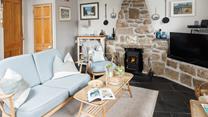The cosy woodburner is ideal for chillier evenings.