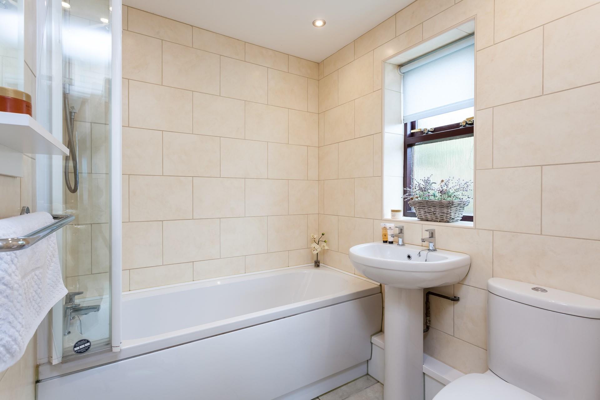 Wash off the sand in the shower or soak in the bath after a day of fun at the beach.