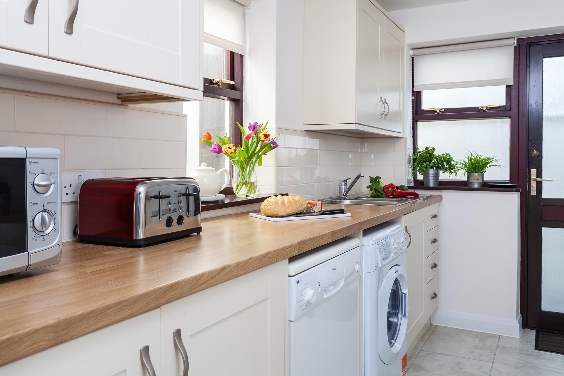 The ample worktop space makes cooking up family dinners a breeze.