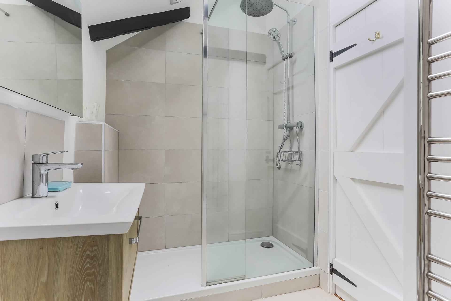 Start your day right with a hot shower and then head to the white sandy Porthcurno beach.