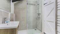 Start your day right with a hot shower and then head to the white sandy Porthcurno beach.