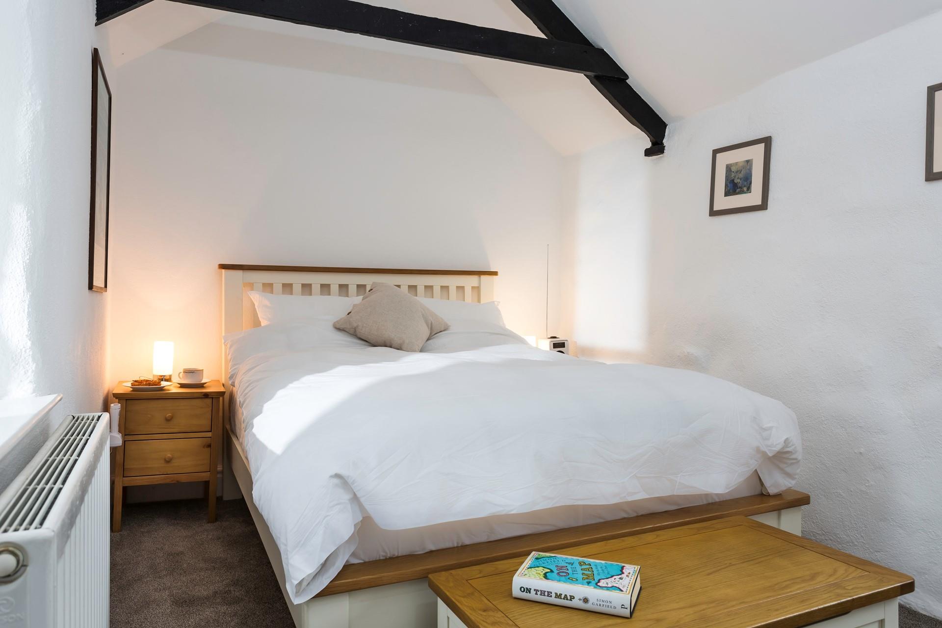 This cosy cottage is perfect for a romantic getaway, cosy into bed after a day spent exploring Cornwall.