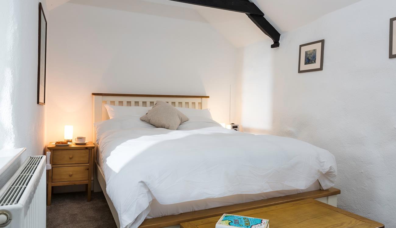 This cosy cottage is perfect for a romantic getaway, cosy into bed after a day spent exploring Cornwall.