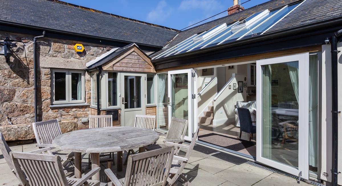 After a day on the beach come back to tuck into a tasty meal in the garden.