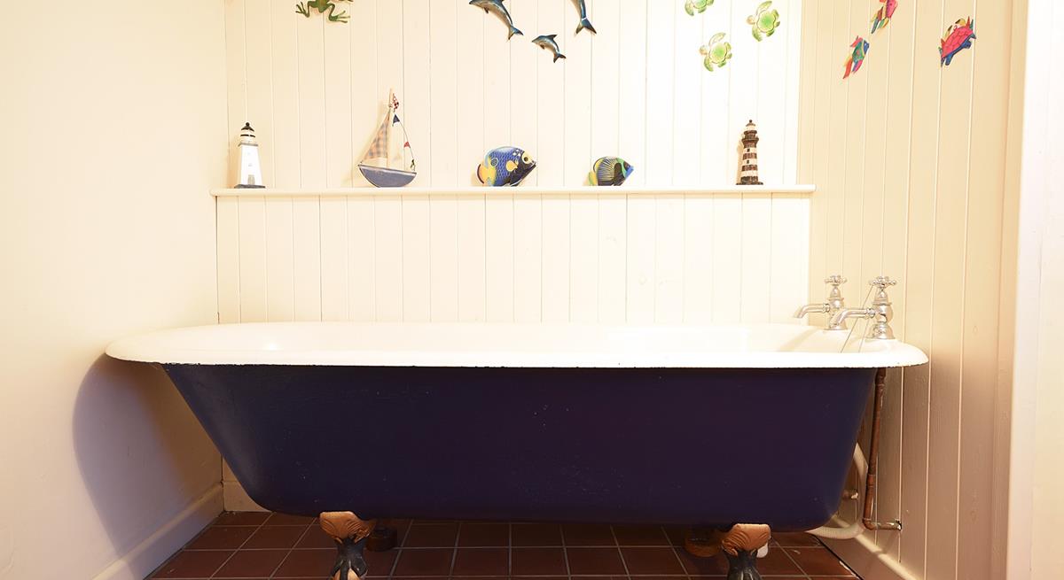 There is an additional free standing bath for relaxing soaks!