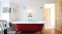 Relax and unwind by enjoying a long soak in the free-standing bath.