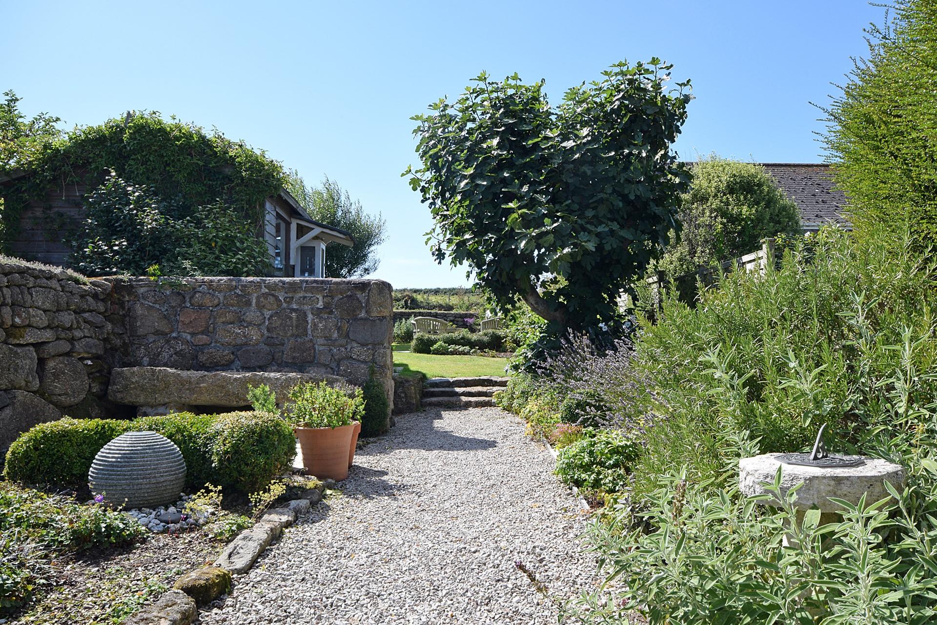 Sunbathe in the leafy garden on sunny afternoons.