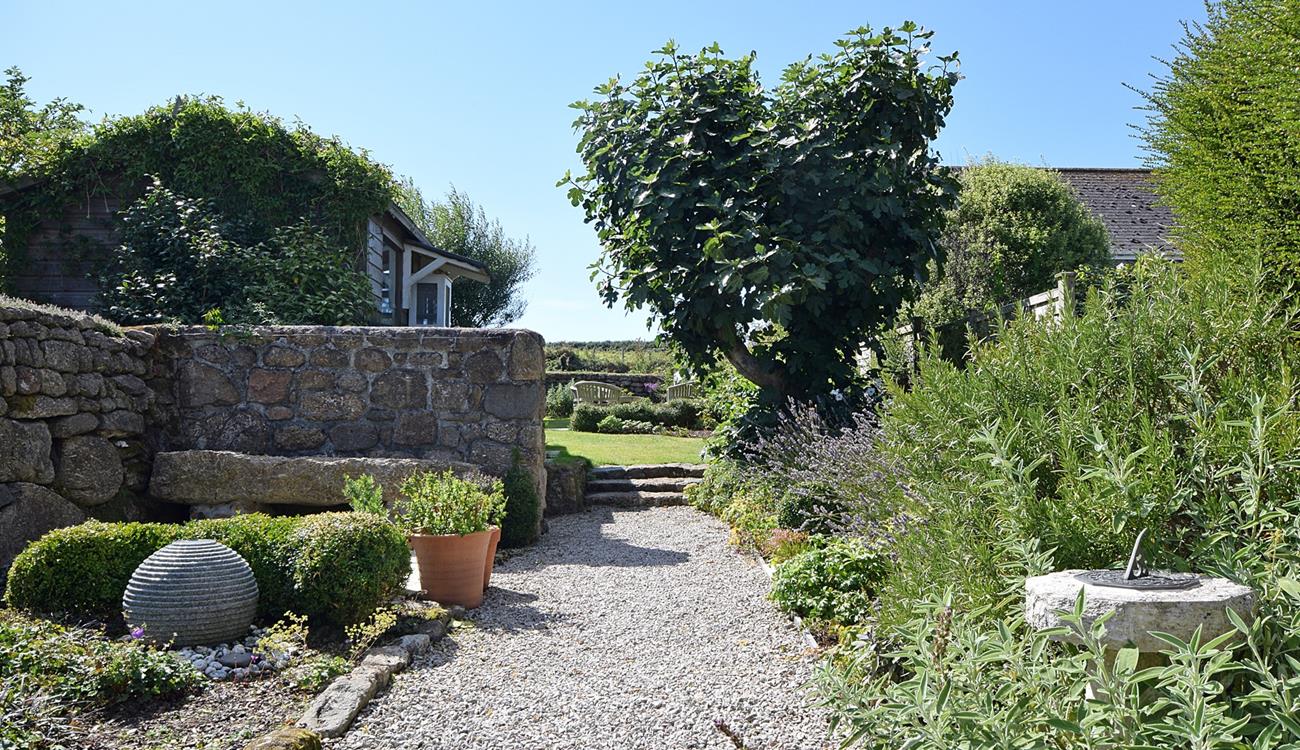 Sunbathe in the leafy garden on sunny afternoons.