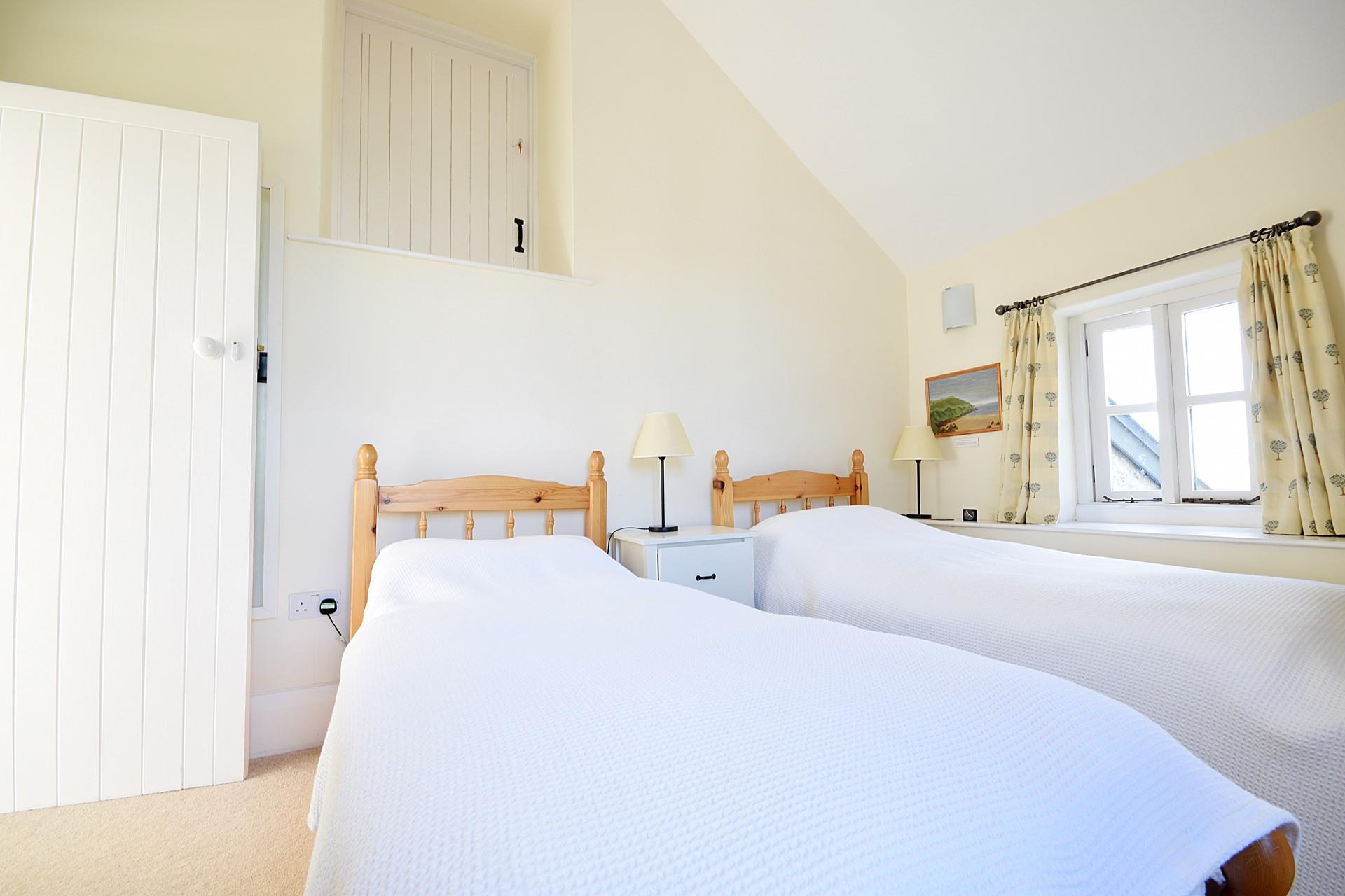 The twin beds are perfect for adults or children to settle into each night.