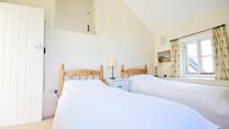 The twin beds are perfect for adults or children to settle into each night.
