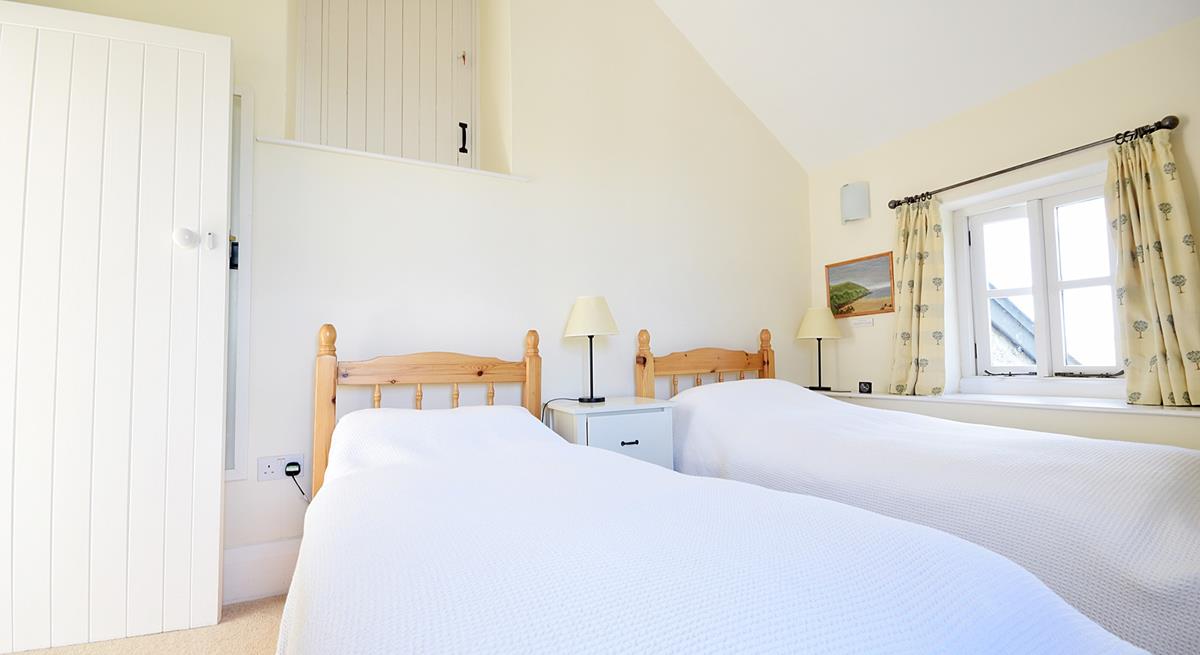 The twin beds are perfect for adults or children to settle into each night.