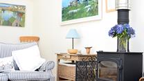 Snuggle up in front of the roaring woodburner on chilly evenings.