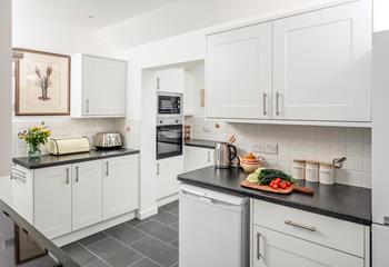 The spacious well-equipped kitchen offers you the perfect space to whip up delicious meals.