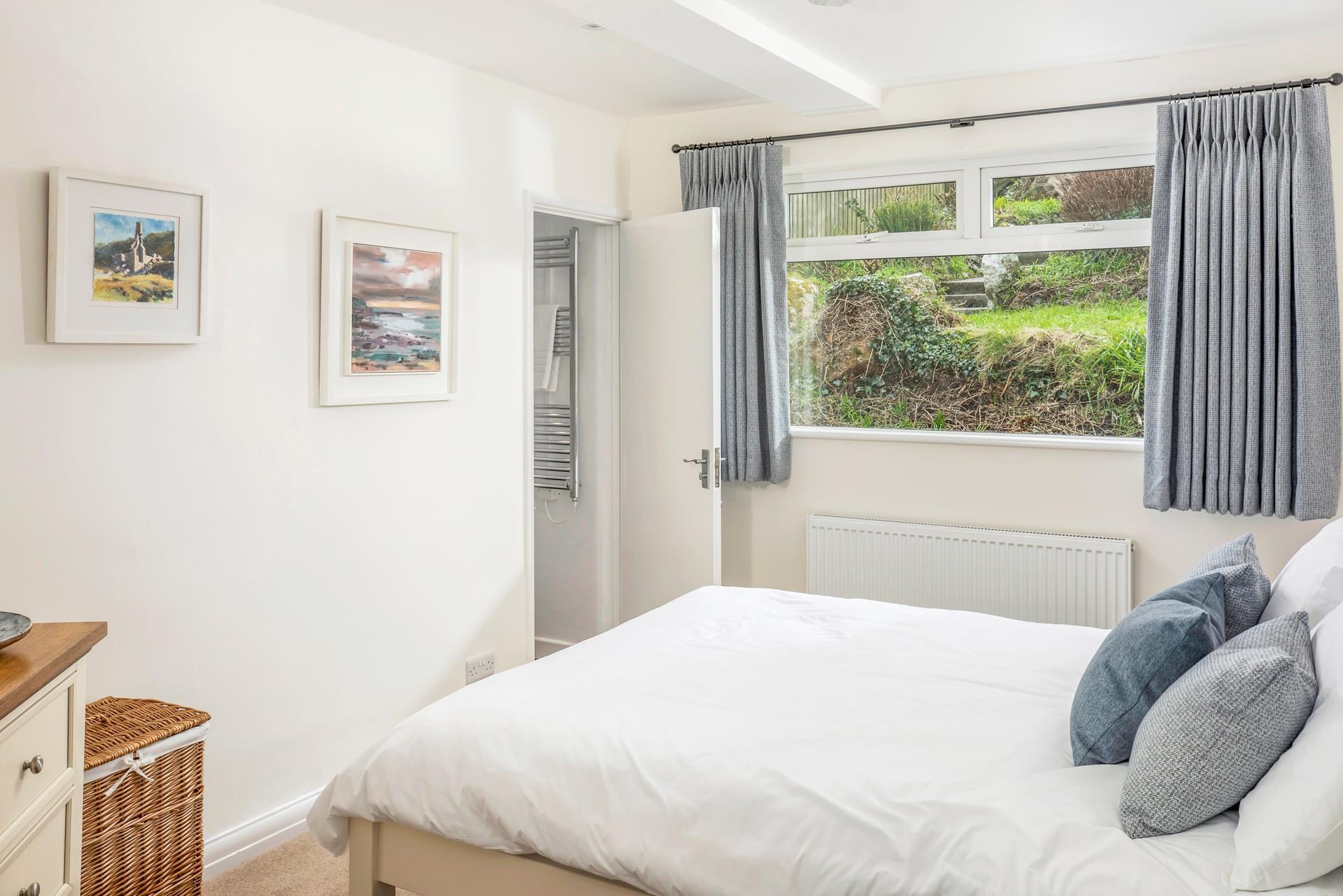 Wander into the en suite to get ready for the day.