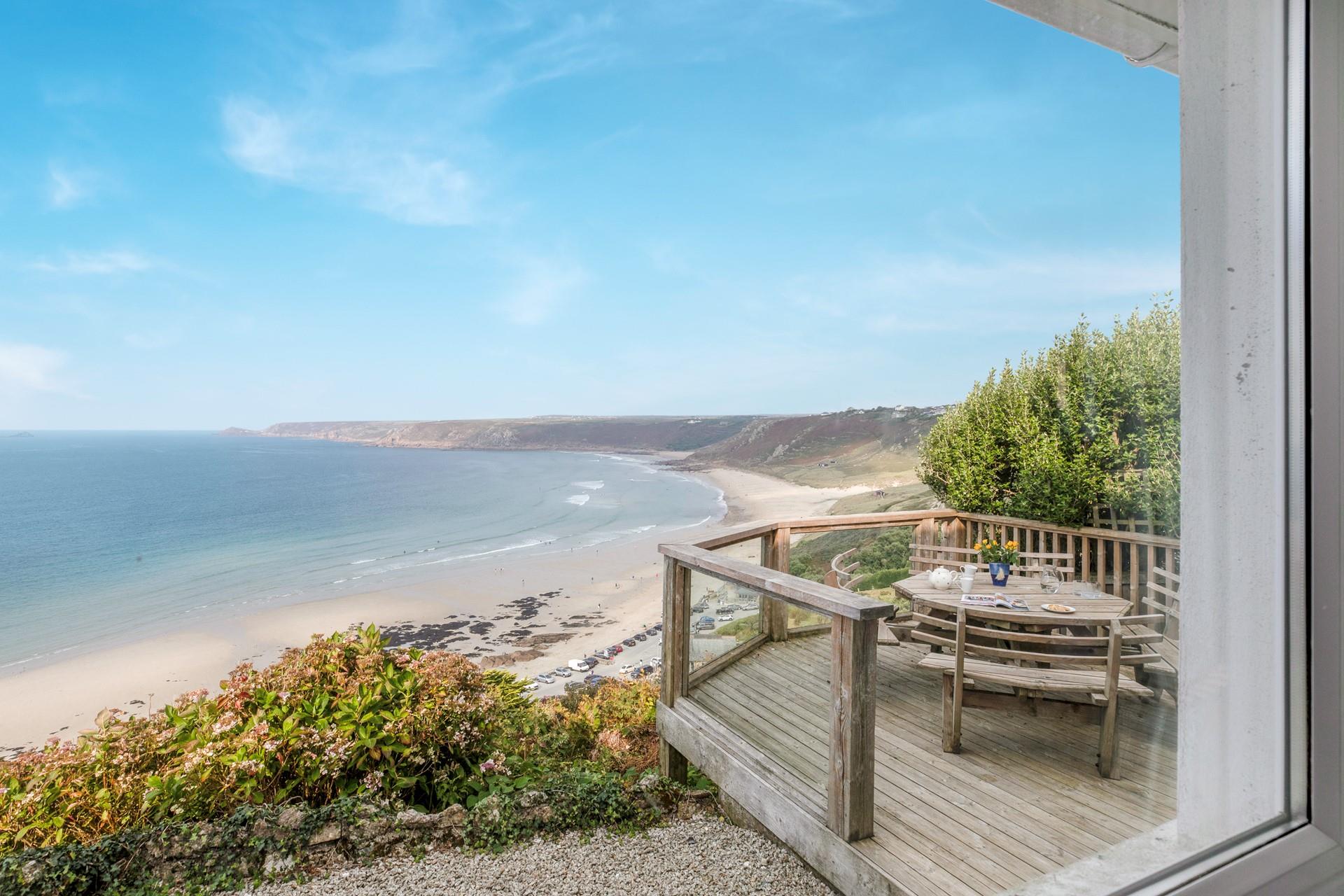 Spend long lazy lunches out on the decking area with a cold glass of wine.