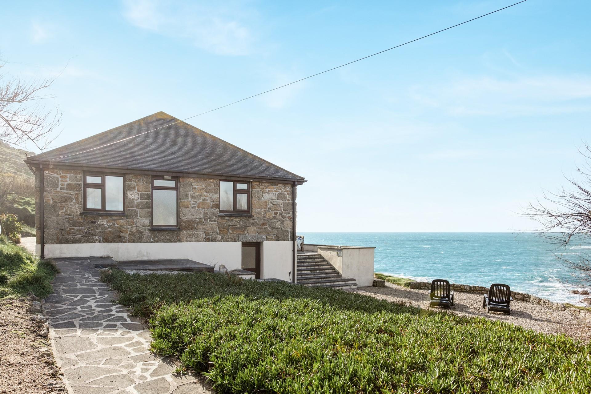 Unwind on the loungers enjoying the sounds of the sea.