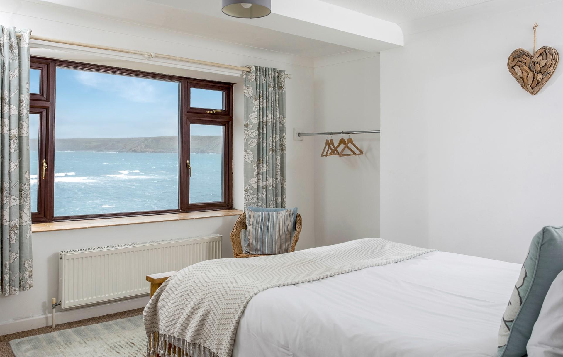 Wake up to far-reaching sea views every morning after a relaxing night's sleep.