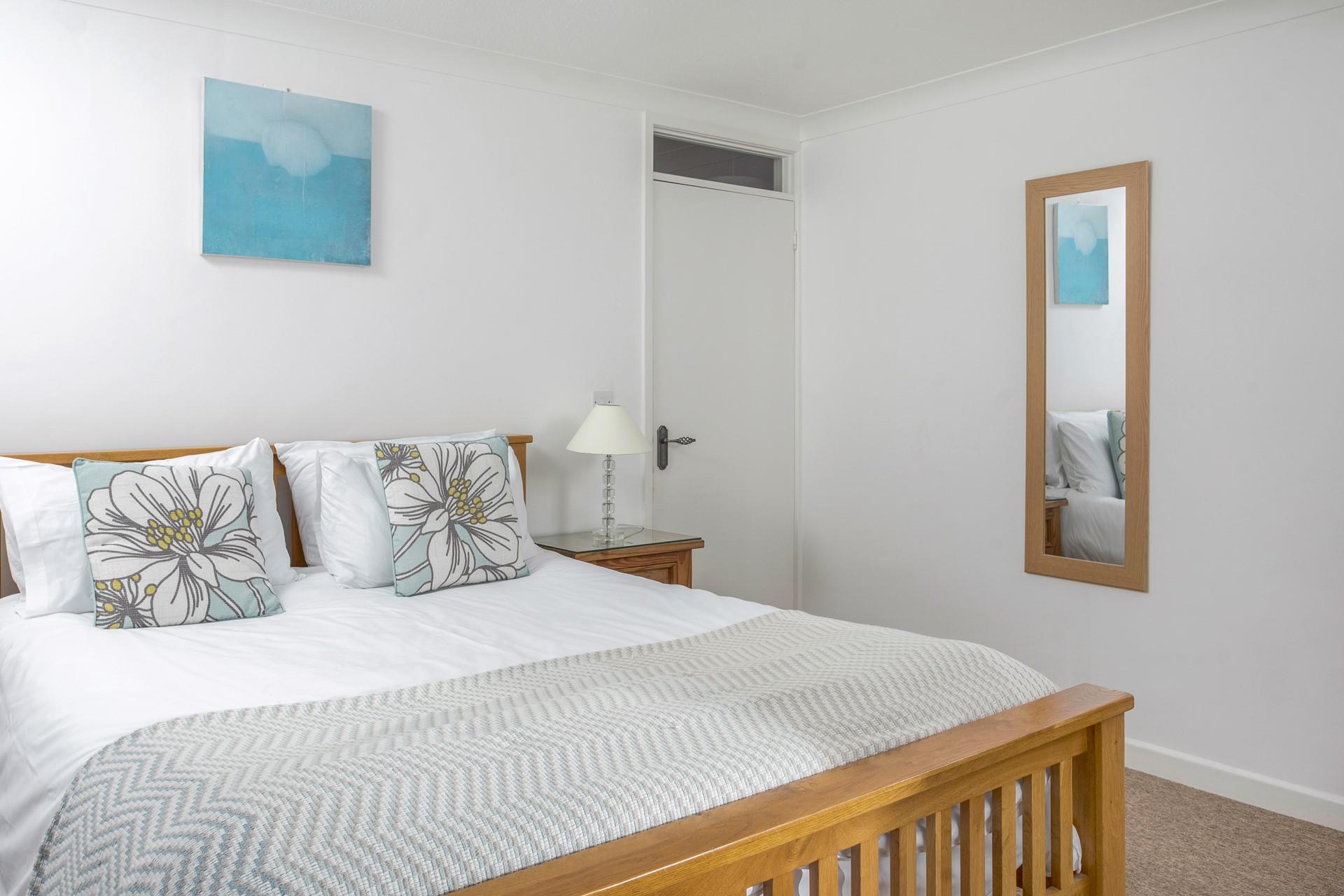 Settle into the soft sheets of the king size bed after a busy day exploring the coast path.