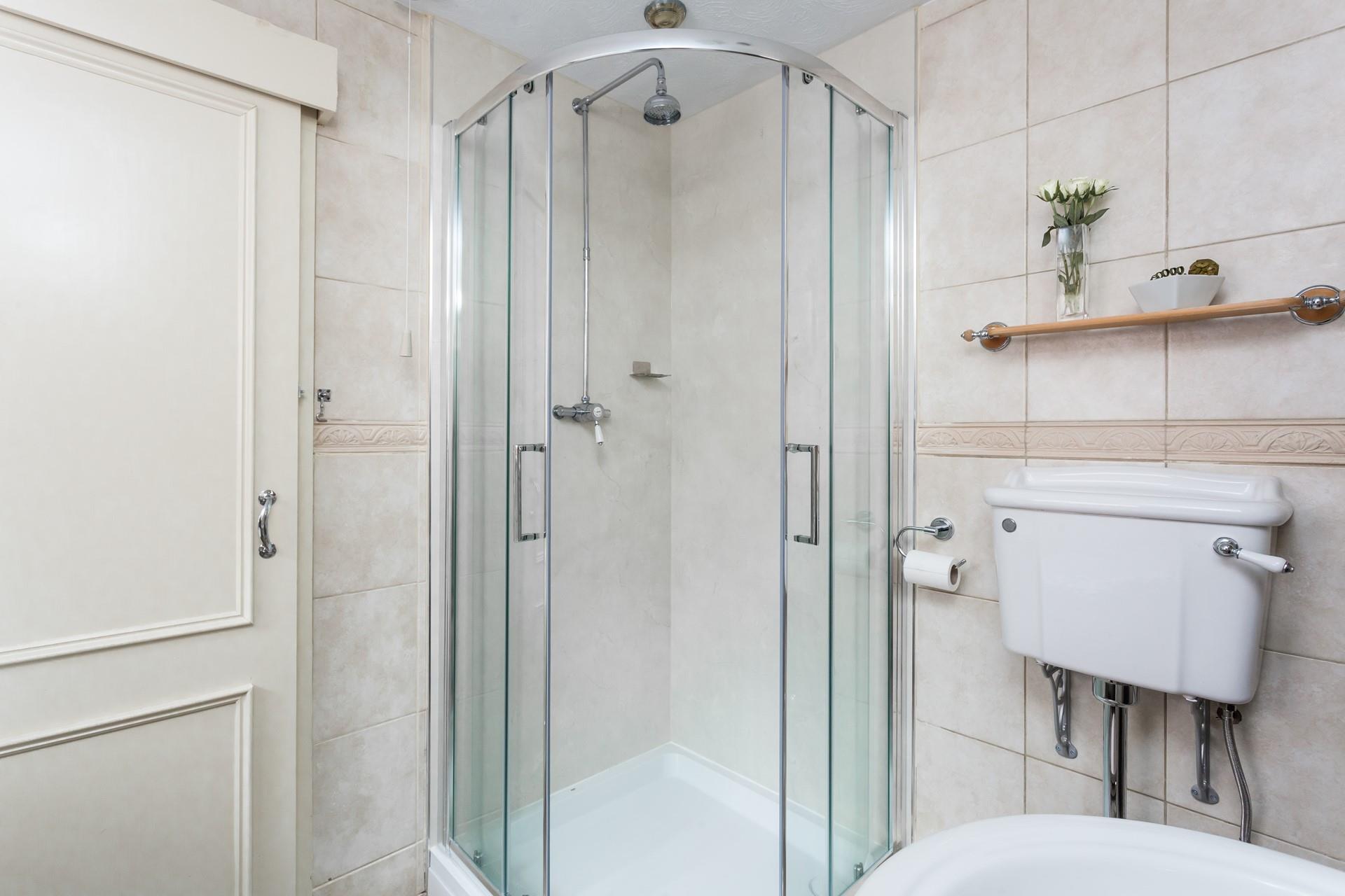 Wash off your sandy toes in the shower after a day on the beach.