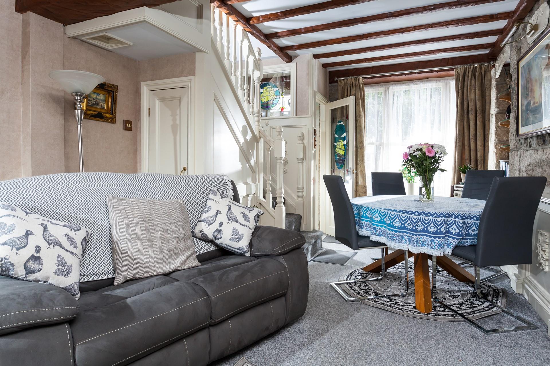 Sit around the dining table and enjoy a tasty meal together.