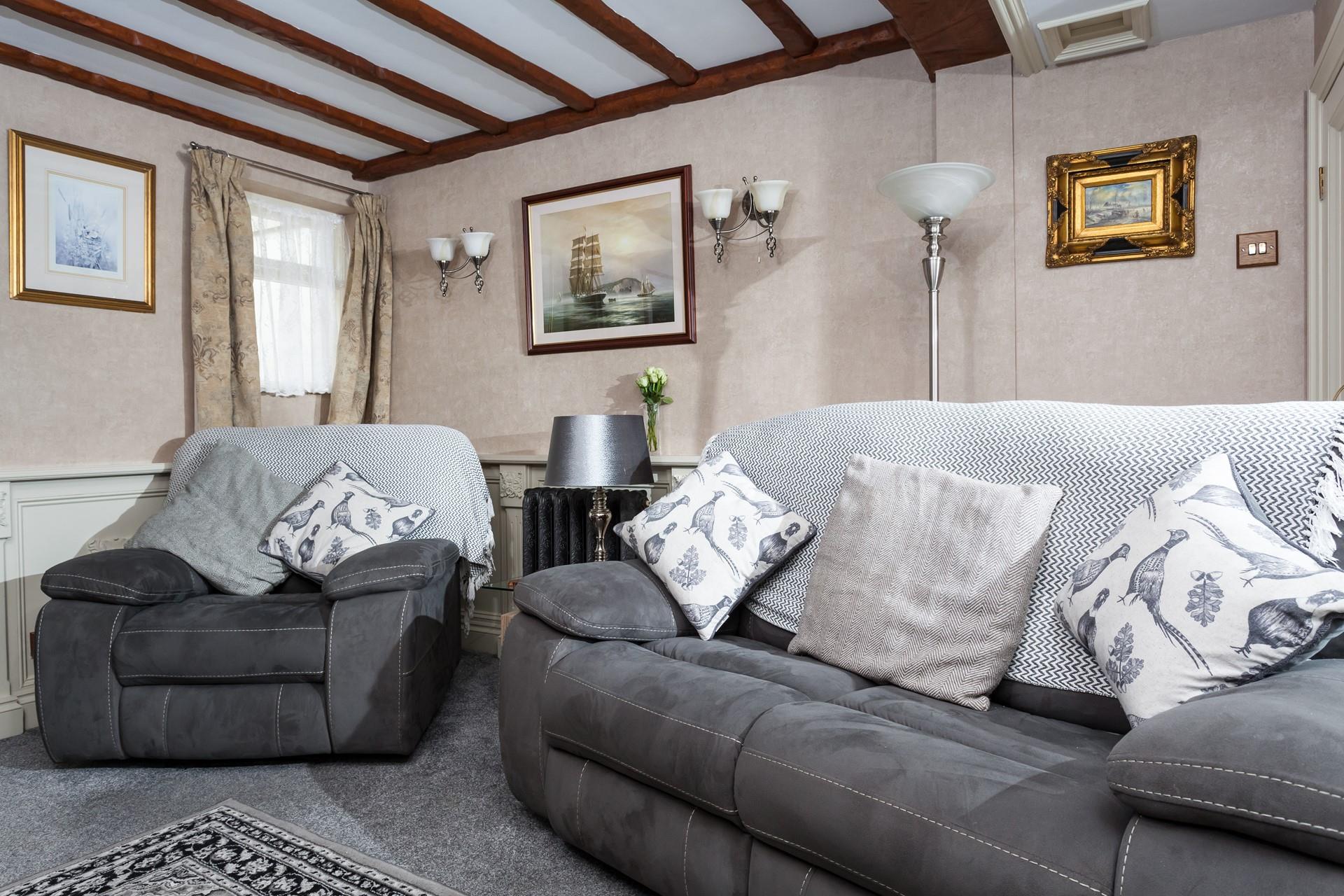 Cosy up under the blankets with the gas fire on after a wintery walk across the beach.