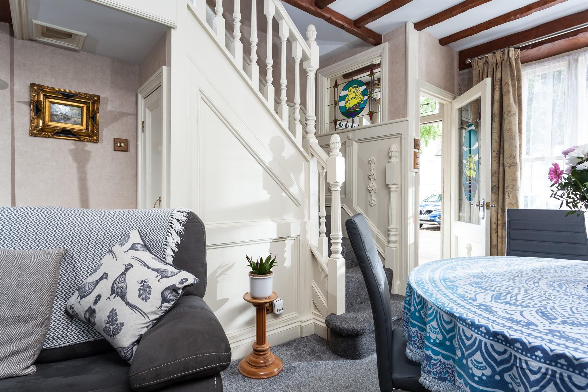 This cosy home still has some of its lovely Victorian features.