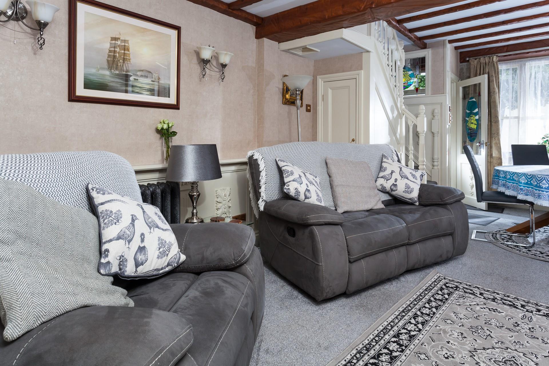 Grey, white and blue interiors complete this cosy home from home.