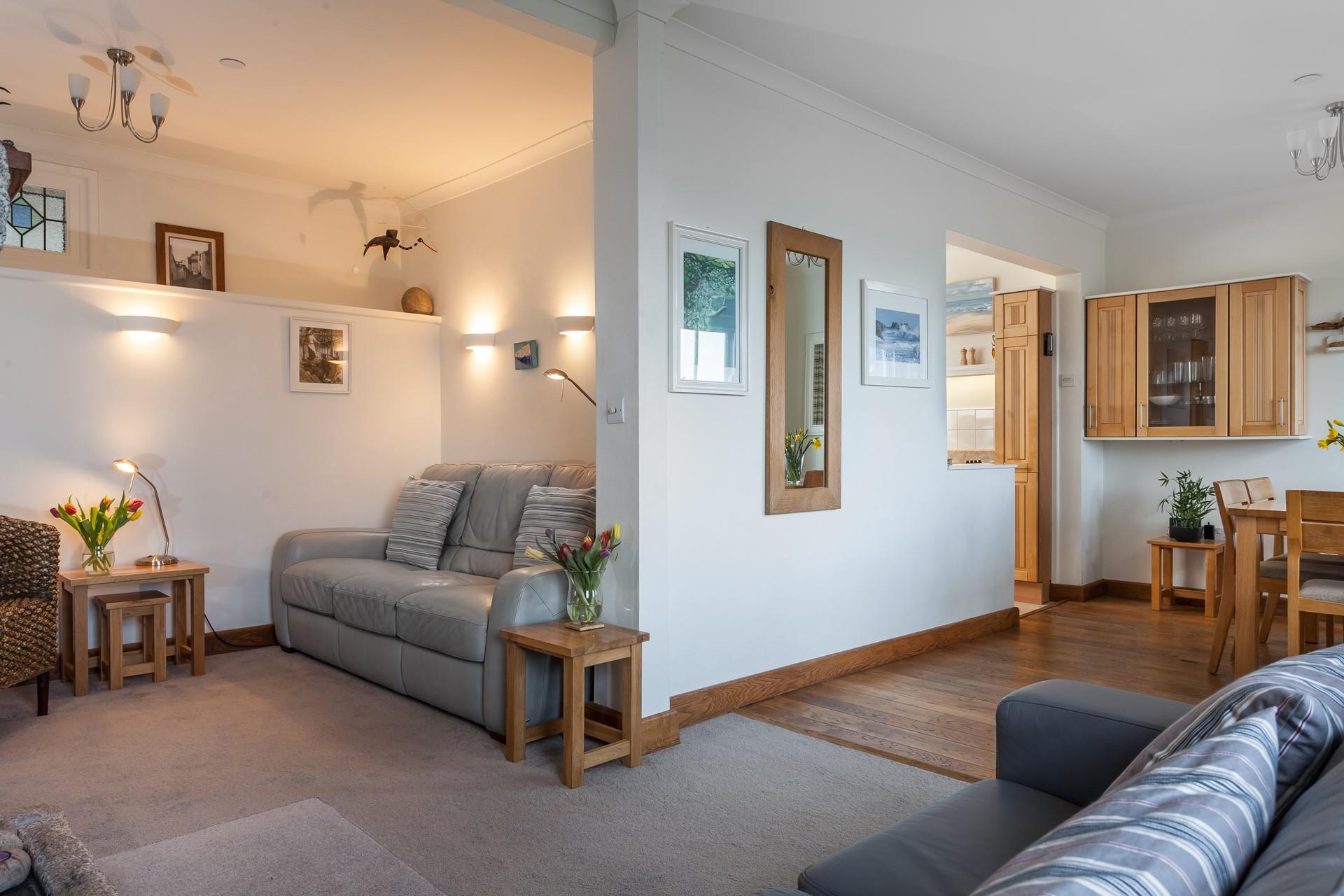 The open plan sitting/dining room is a great space for all the family to spend quality time together.