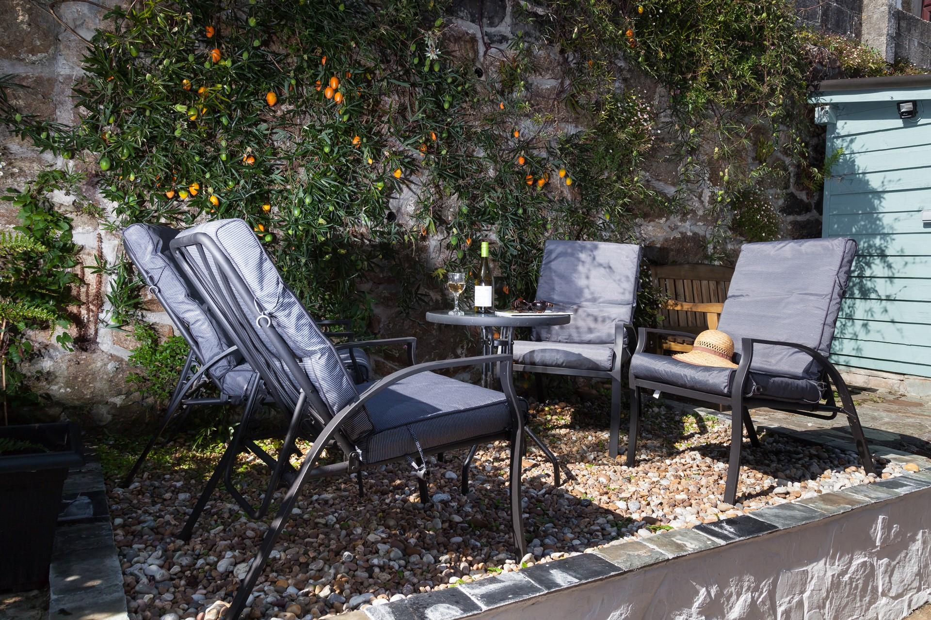 Open a bottle of wine and enjoy some quiet time in the peaceful garden.