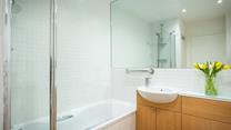 Start the day with an invigorating shower before getting ready to head to the beach.