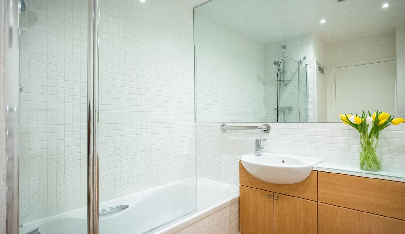 Start the day with an invigorating shower before getting ready to head to the beach.