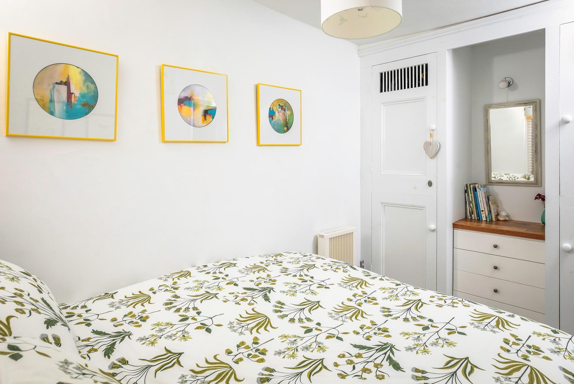 Built-in wardrobes and drawers provide lots of storage space during your stay. 