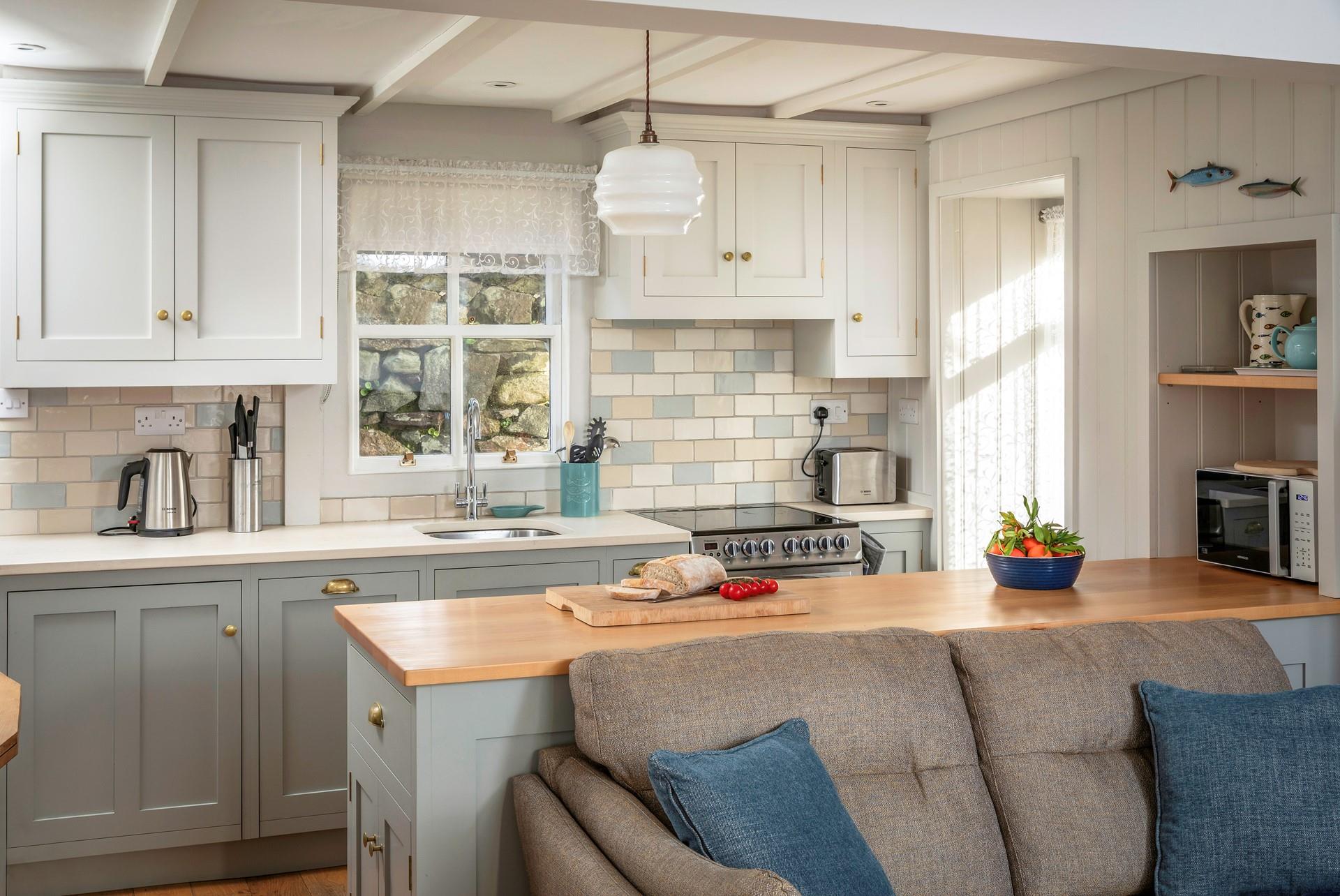 An open plan living and kitchen makes the most of family time together.