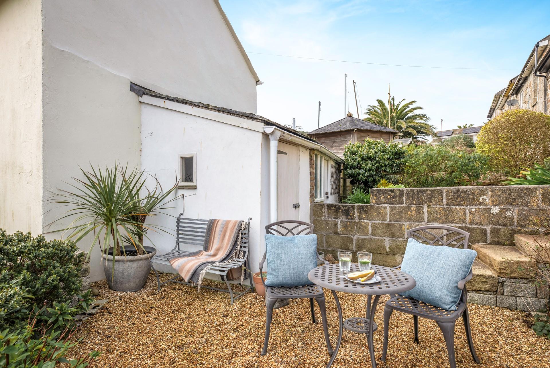 A private front patio area is perfect for lunch in the sun with sea views. 