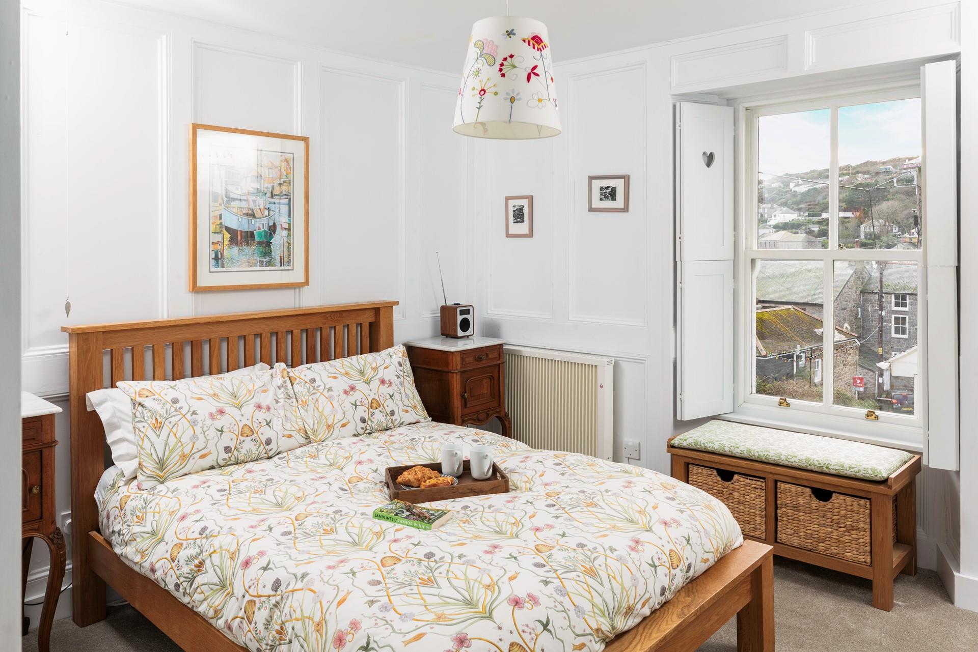 This comfortable double room has beautiful details and handmade shutters.