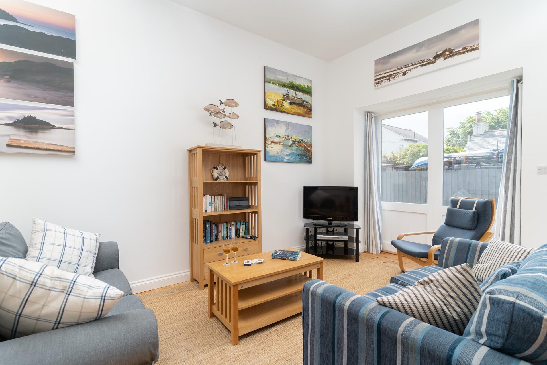 A cosy space to put your feet up after a day of seaside adventures.