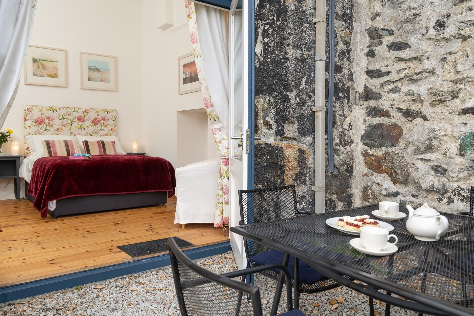 Enjoy a cream tea in the quaint courtyard.