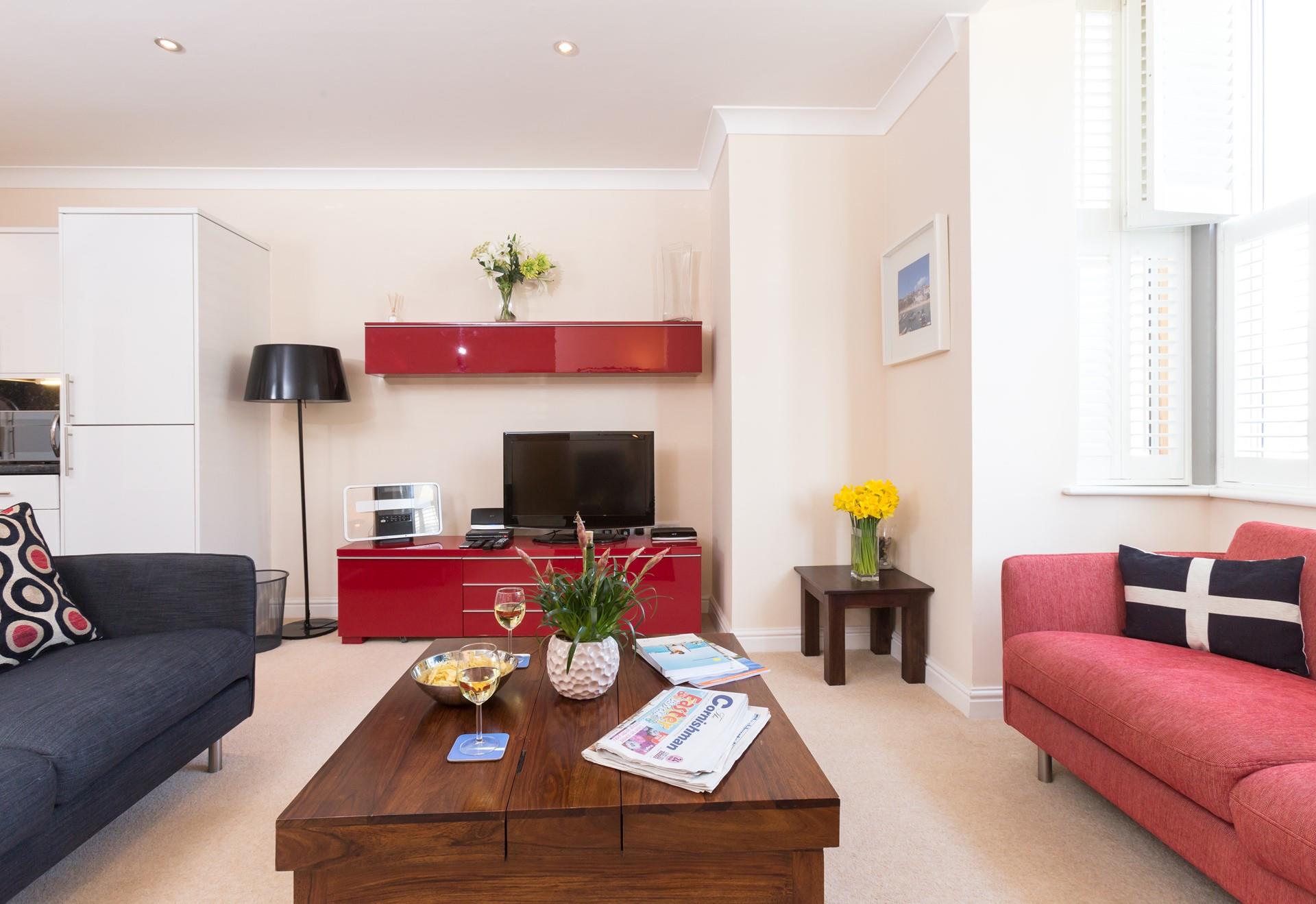 Sit back and relax on the sofa, enjoying time together.