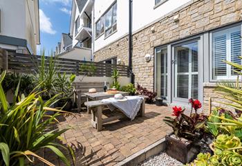 Enjoy al fresco dining in the courtyard garden.