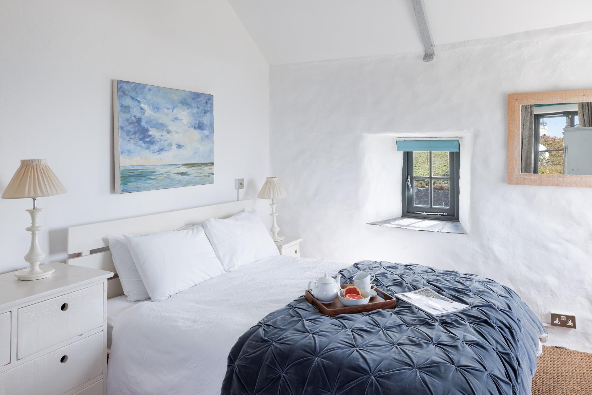 Listen to the waves from the comfort of the double bed.
