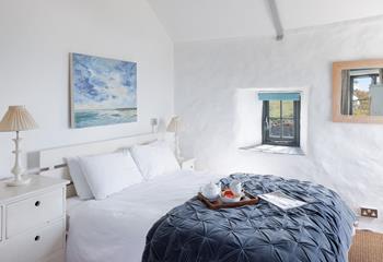 Listen to the waves from the comfort of the double bed.