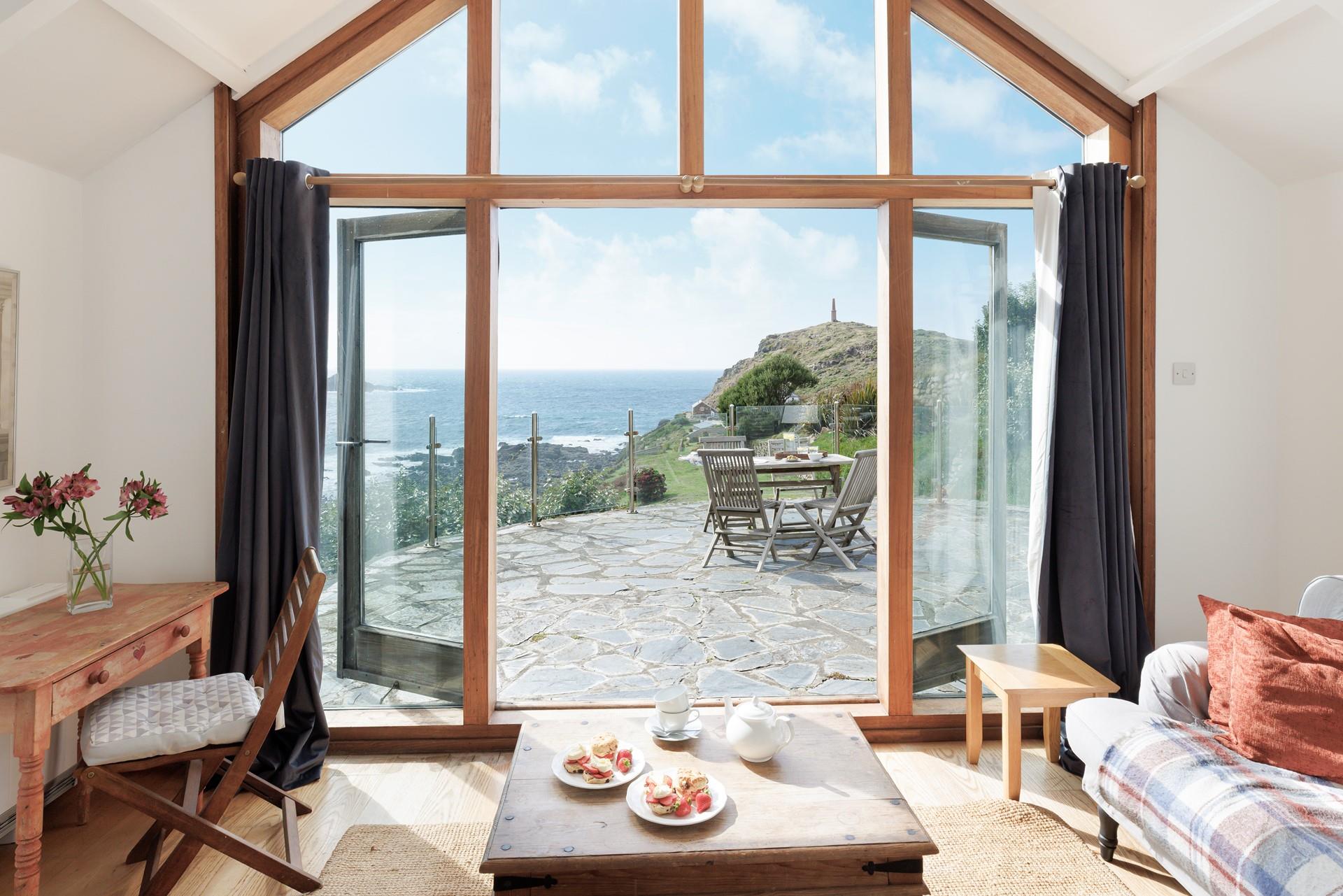 Wander out to the patio to sip a glass of something cold and look out to sea.