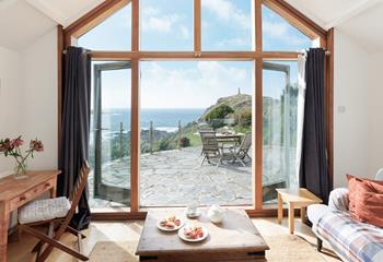 Wander out to the patio to sip a glass of something cold and look out to sea.