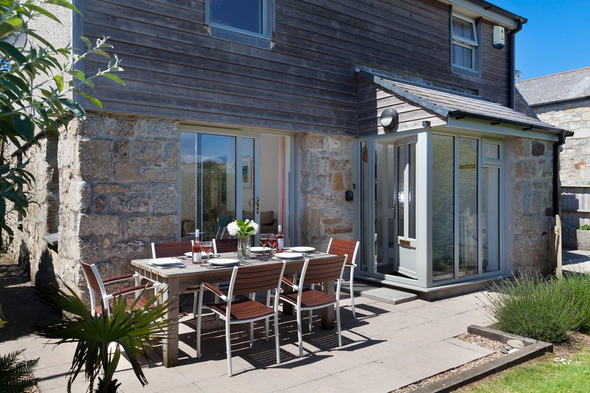 On a balmy summer's evening, enjoy dining al fresco on the patio. 