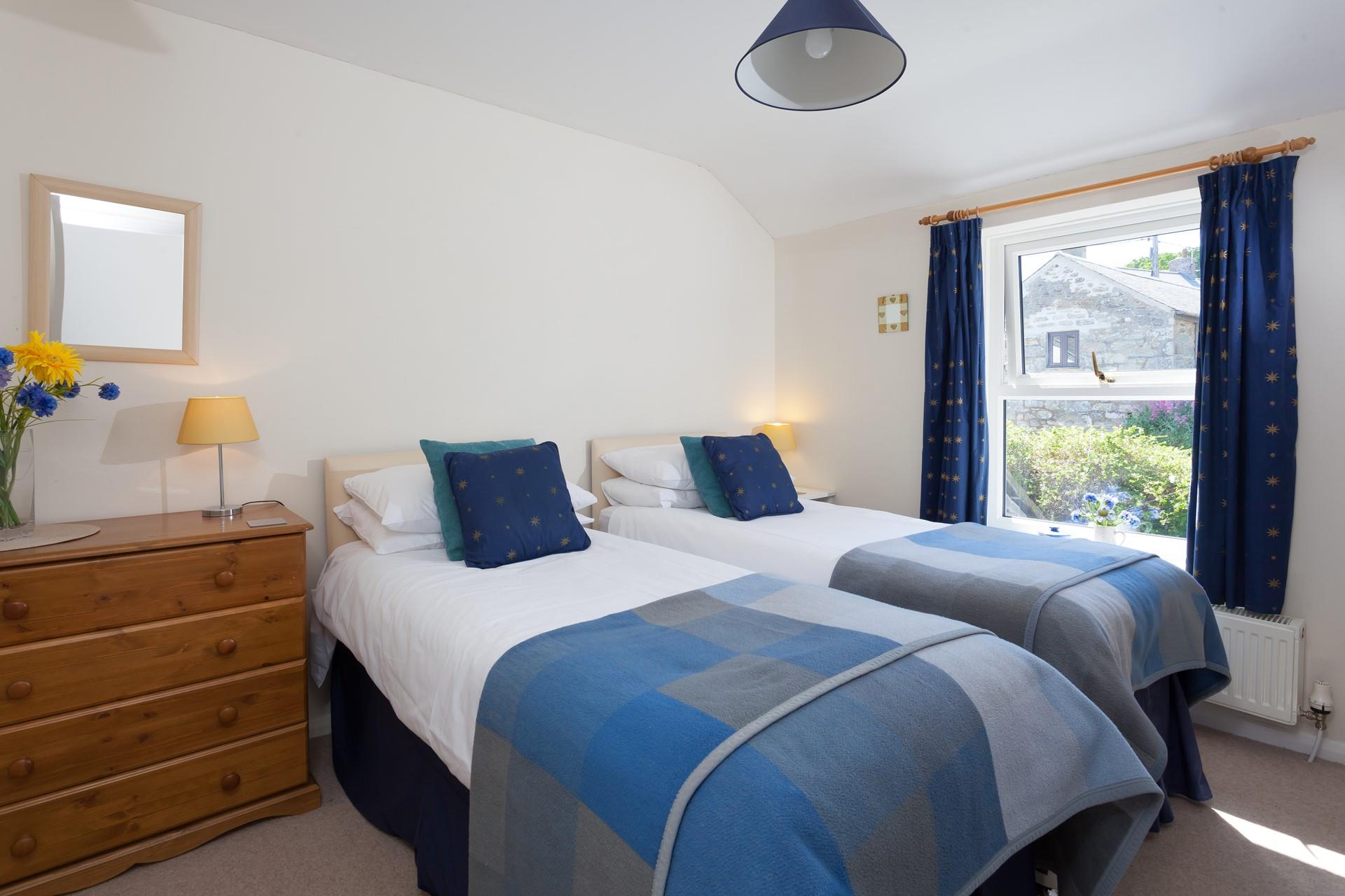 On a sunny day, enjoy the sunshine that streams through the large window. 