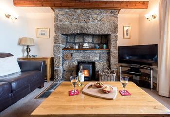 Enjoy drinks and nibbles in the cosy sitting room.