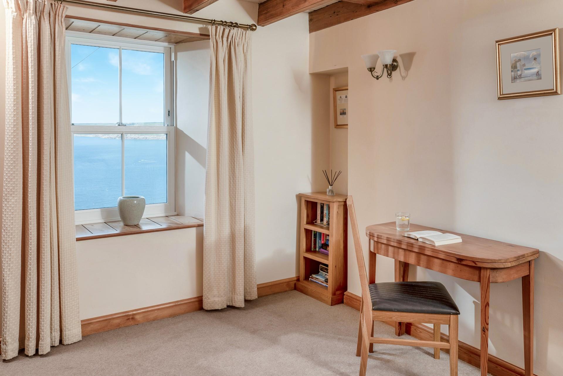The snug also benefits from lovely sea views.