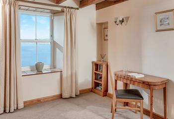 The snug also benefits from lovely sea views.