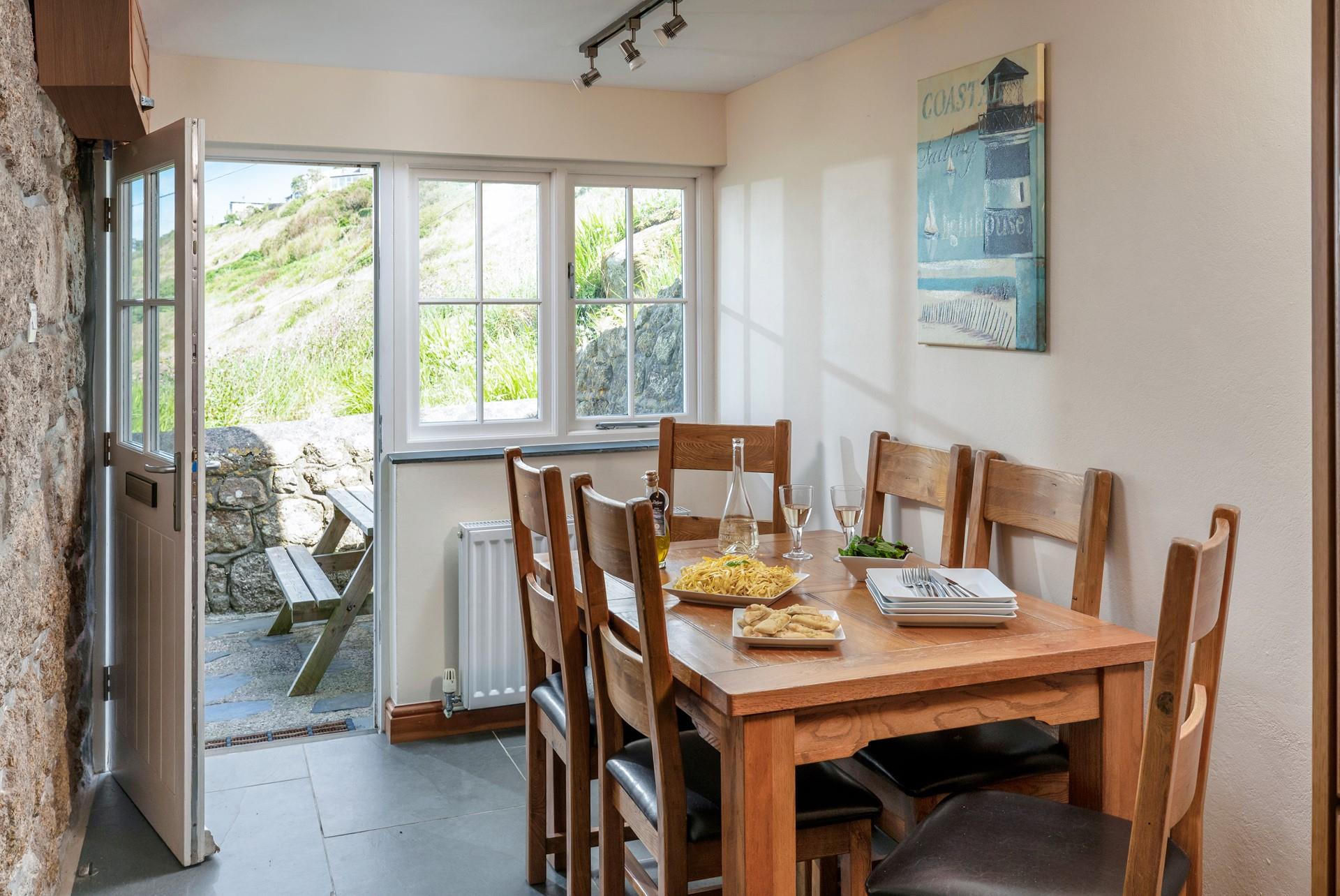 Step from the dining area and onto the patio.